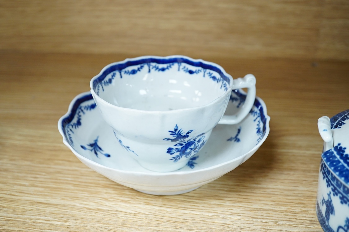 A group of 18th century Worcester and Liverpool porcelain teaware and a Caughley Cormorant fisherman butter tub and cover.